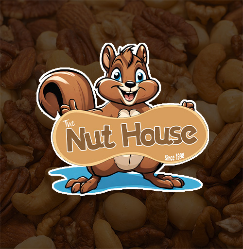 Background of varius nuts with Squirrel holding a sign saying the Nut House